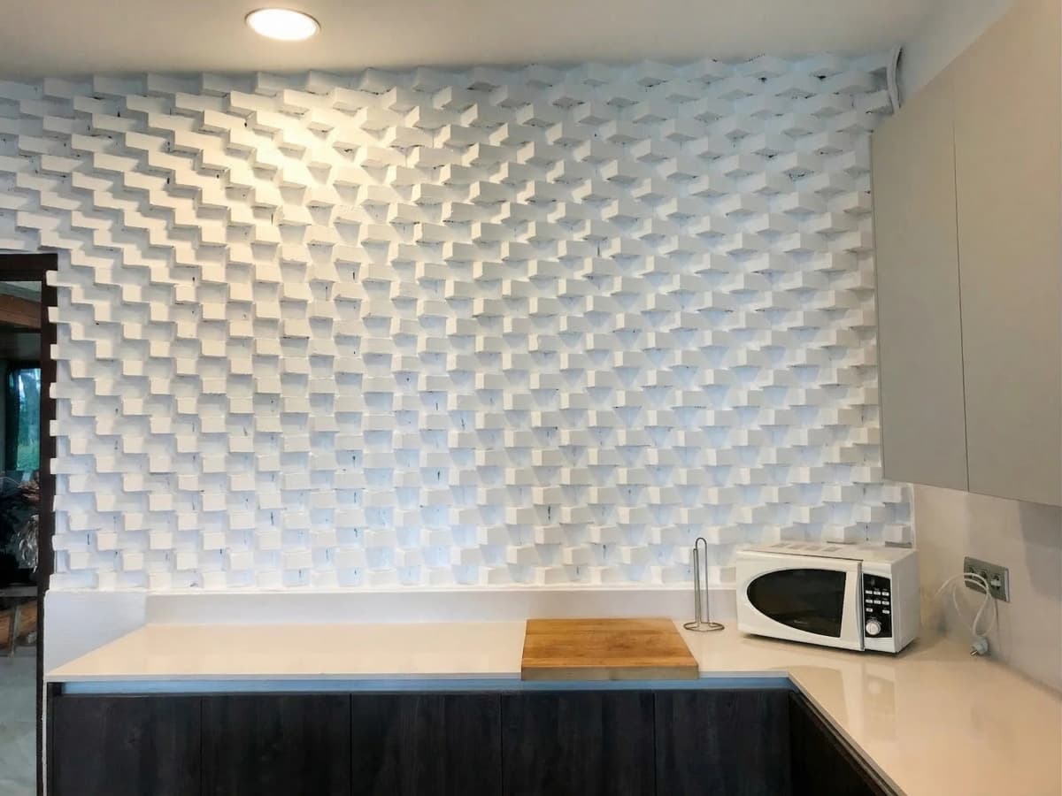 Modern kitchen with 3D textured wall