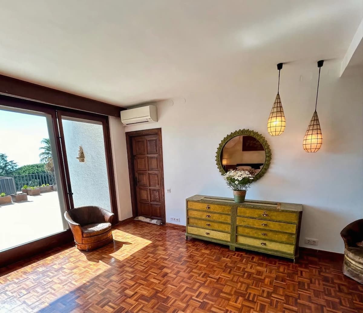 Entrance hall with antique dresser and mirror