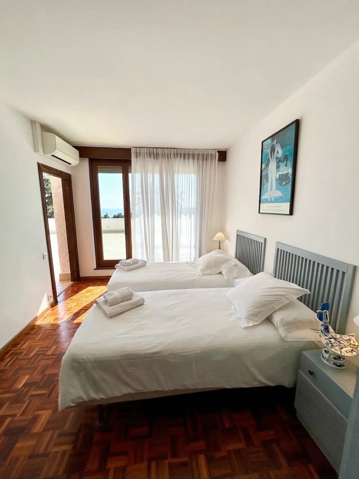 Bright bedroom with terrace access