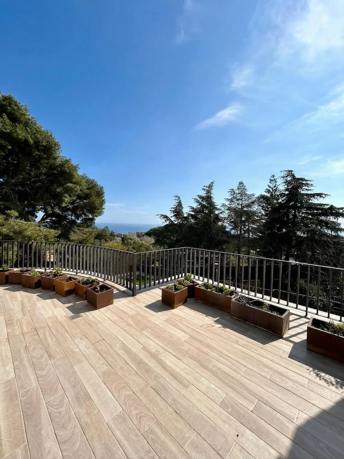 Terrace with planters and sea view