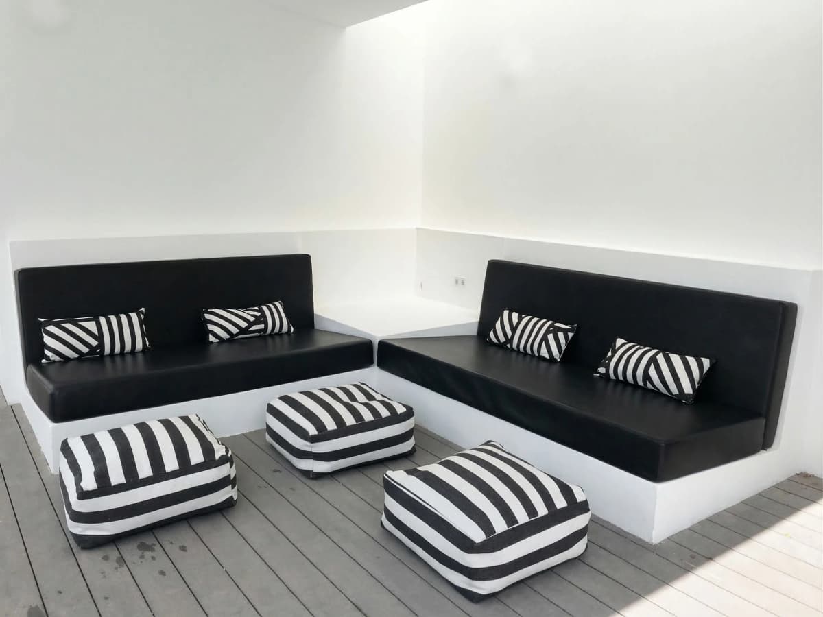 Black and white striped lounge area