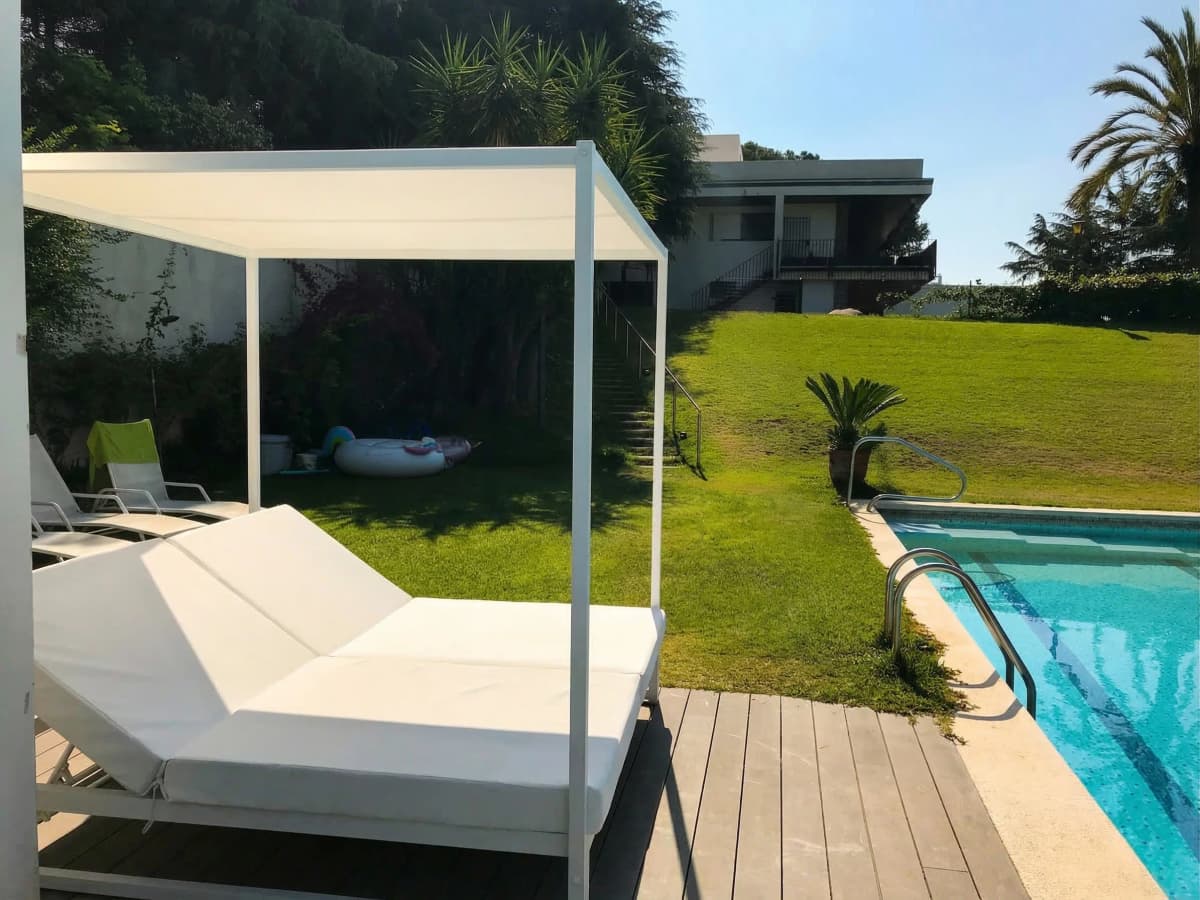 Cabana daybed beside the pool