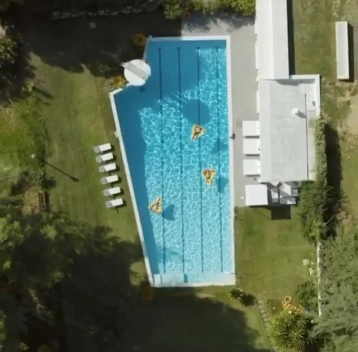 Aerial view of the swimming pool with inflatables